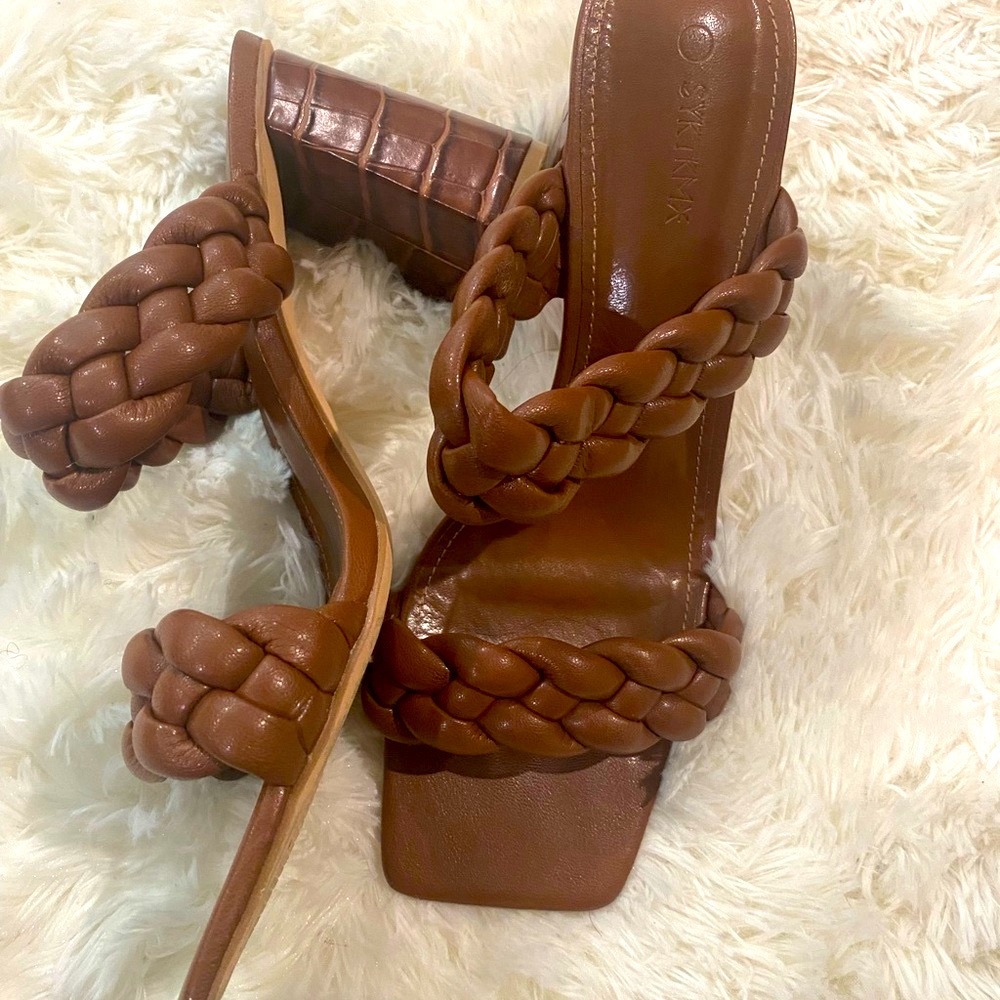Size 11 braided sandals.  Worn once. Very fashionable.  My lost ur gain.
